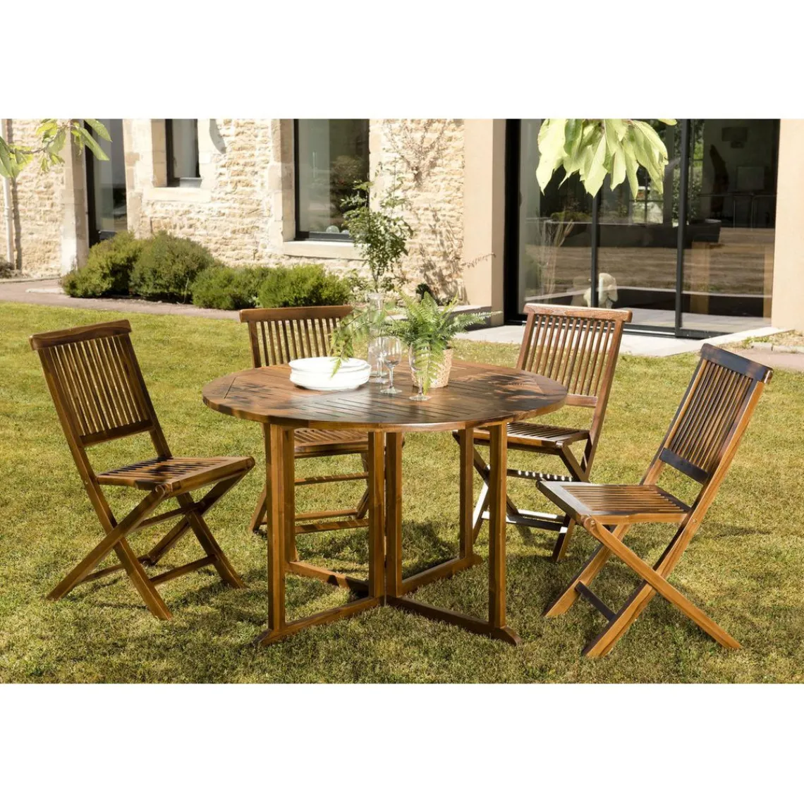 Macabane Salon de jardin HANNA en bois teck huilé 4/5 personnes - ensemble de jardin : 1 table ronde à rabats papillon et 4 chaises