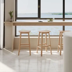 ALTEREGO Tabouret snack mi-hauteur 'DUMAS MINI' en bois finition naturelle