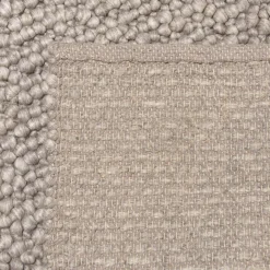 Macabane Tapis rectangulaire en laine bouclée taupe QUENTIN